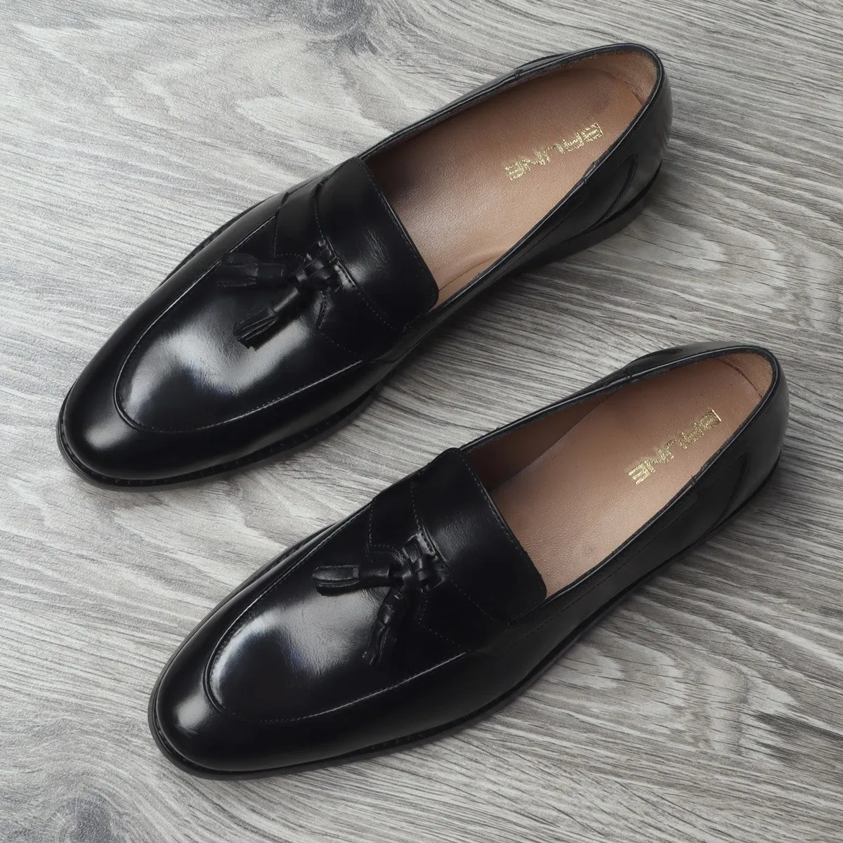 Black Leather Apron Toe Tassel Slip-ons by Brune & Bareskin